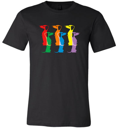 Black tee with six Dachshund dogs in pride rainbow colors.