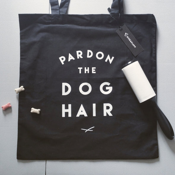 Pardon the Dog Hair black tote bag.